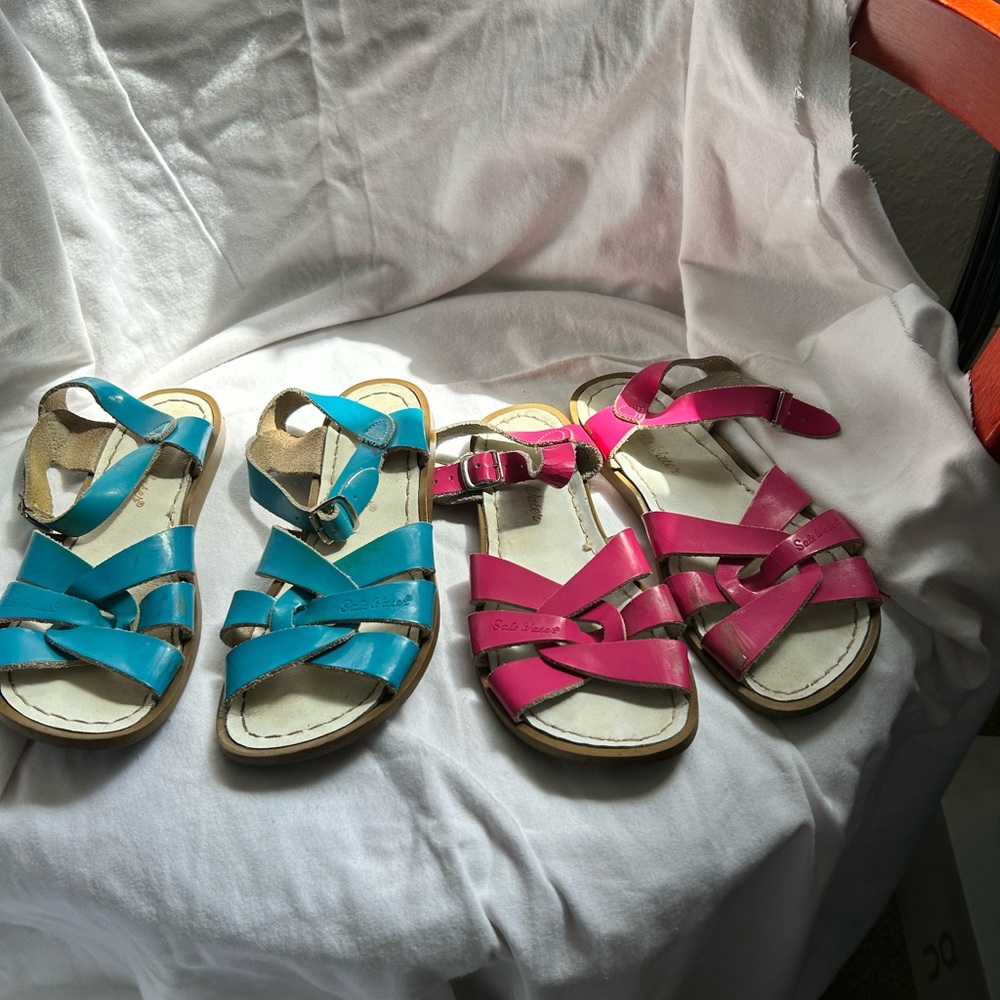 Two pairs of Saltwater Sandals by Hoy